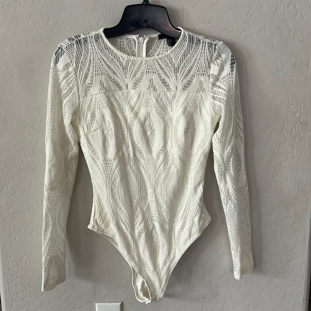 Women’s brand new long sleeve body suit